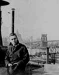Photo of Hart Crane by the Brooklyn Bridge