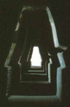 Image of odd shaped tunnel with repetitious rings of light