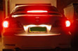Rear view of a car with brake lights on