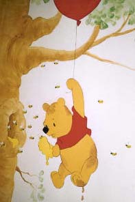 Bear, balloon and bees in tree