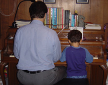 Papa and Terry playing a piano duet
